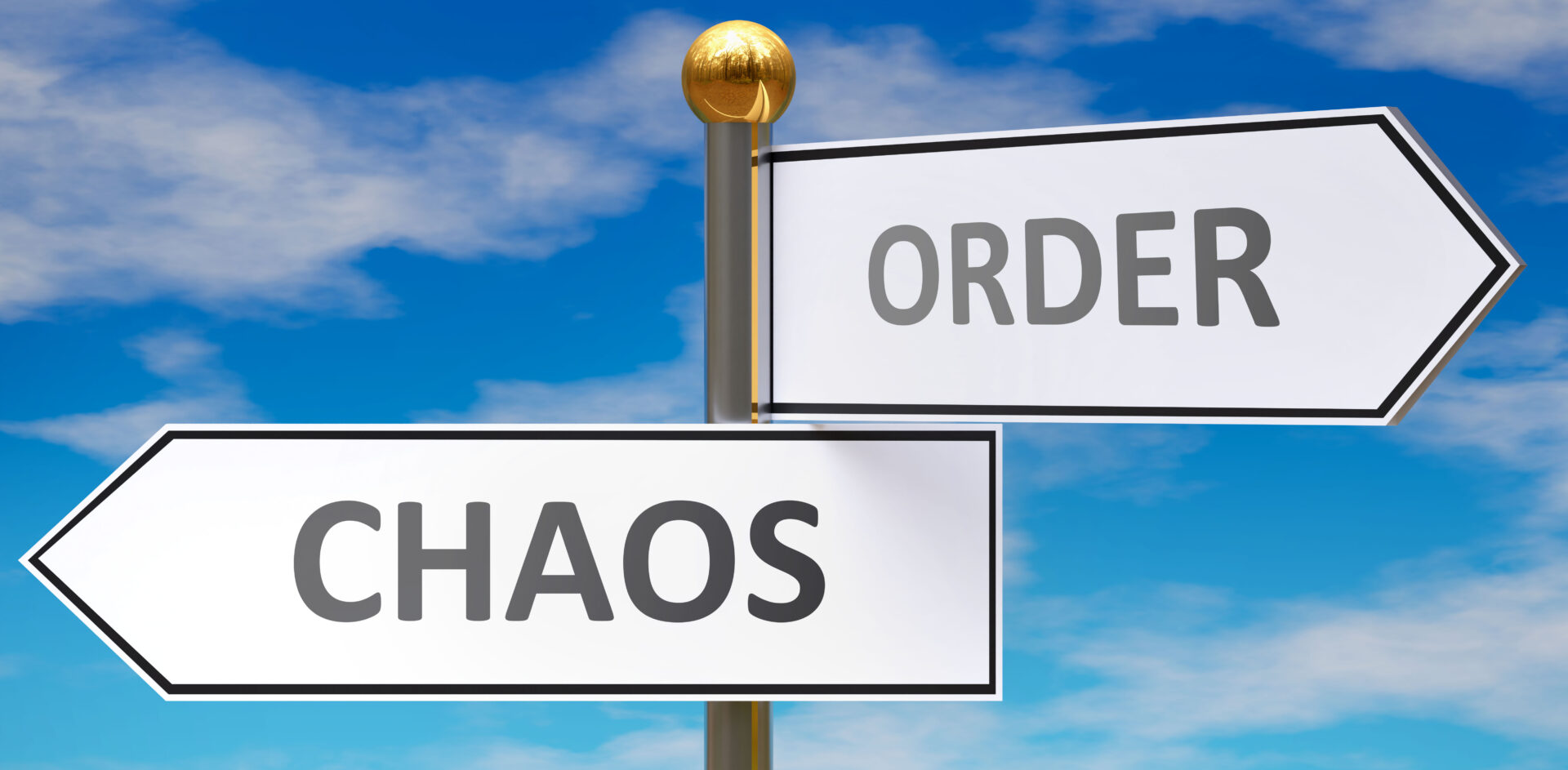 A pole with two signs on it that say order and chaos.